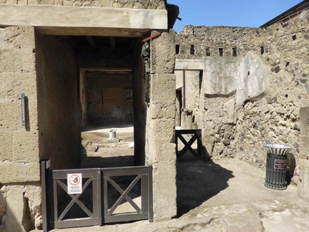 VI.17, on left, and VI.18 Herculaneum. June 2014. Looking south to entrace doorways.
Photo courtesy of Michael Binns.